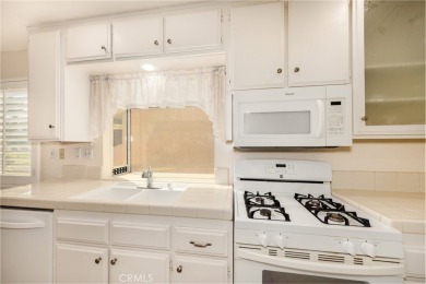 This is a home located within the desirable community of Sun on Sun Lakes Country Club in California - for sale on GolfHomes.com, golf home, golf lot
