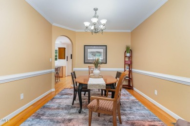 Tree lined street leads you to this Charming 3 bedroom 2.5 bath on Devils Ridge Golf Club in North Carolina - for sale on GolfHomes.com, golf home, golf lot
