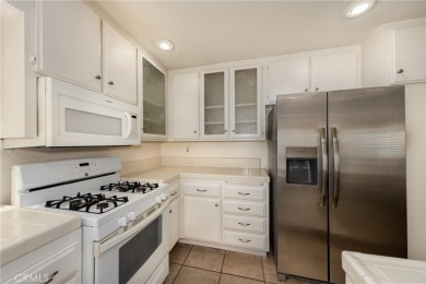This is a home located within the desirable community of Sun on Sun Lakes Country Club in California - for sale on GolfHomes.com, golf home, golf lot