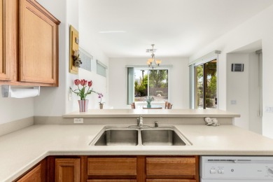 Lovely extended LANAI model on beautiful park-like large lot on Mountain Vista Golf Course At Sun City Palm Desert in California - for sale on GolfHomes.com, golf home, golf lot