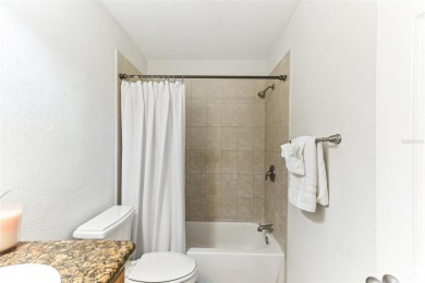 Welcome to this delightful second-floor end-unit condo, offering on East Bay Golf Club in Florida - for sale on GolfHomes.com, golf home, golf lot