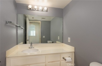 This is a home located within the desirable community of Sun on Sun Lakes Country Club in California - for sale on GolfHomes.com, golf home, golf lot