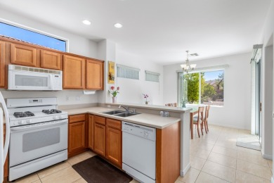 Lovely extended LANAI model on beautiful park-like large lot on Mountain Vista Golf Course At Sun City Palm Desert in California - for sale on GolfHomes.com, golf home, golf lot