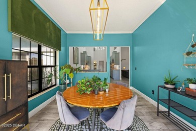 FULLY FURNISHED 5 bedroom 4 bathroom luxurious pool home sits in on Spruce Creek Golf Club in Florida - for sale on GolfHomes.com, golf home, golf lot