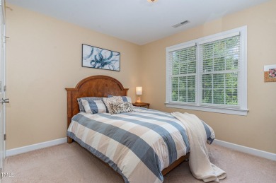 Tree lined street leads you to this Charming 3 bedroom 2.5 bath on Devils Ridge Golf Club in North Carolina - for sale on GolfHomes.com, golf home, golf lot