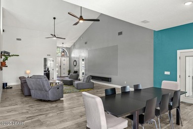 FULLY FURNISHED 5 bedroom 4 bathroom luxurious pool home sits in on Spruce Creek Golf Club in Florida - for sale on GolfHomes.com, golf home, golf lot