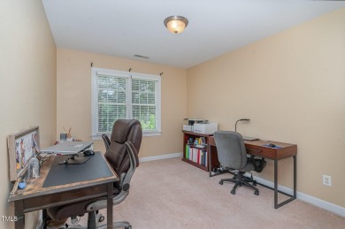 Tree lined street leads you to this Charming 3 bedroom 2.5 bath on Devils Ridge Golf Club in North Carolina - for sale on GolfHomes.com, golf home, golf lot