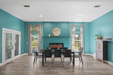 FULLY FURNISHED 5 bedroom 4 bathroom luxurious pool home sits in on Spruce Creek Golf Club in Florida - for sale on GolfHomes.com, golf home, golf lot