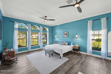 FULLY FURNISHED 5 bedroom 4 bathroom luxurious pool home sits in on Spruce Creek Golf Club in Florida - for sale on GolfHomes.com, golf home, golf lot