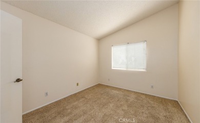 This is a home located within the desirable community of Sun on Sun Lakes Country Club in California - for sale on GolfHomes.com, golf home, golf lot