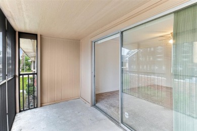 Welcome to this delightful second-floor end-unit condo, offering on East Bay Golf Club in Florida - for sale on GolfHomes.com, golf home, golf lot