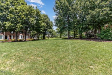 Tree lined street leads you to this Charming 3 bedroom 2.5 bath on Devils Ridge Golf Club in North Carolina - for sale on GolfHomes.com, golf home, golf lot
