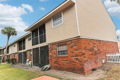 Welcome to this delightful second-floor end-unit condo, offering on East Bay Golf Club in Florida - for sale on GolfHomes.com, golf home, golf lot
