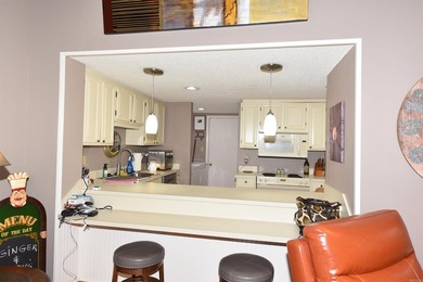 Experience the casual lifestyle of golf course living in this on Indian Hills Country Club in Arkansas - for sale on GolfHomes.com, golf home, golf lot