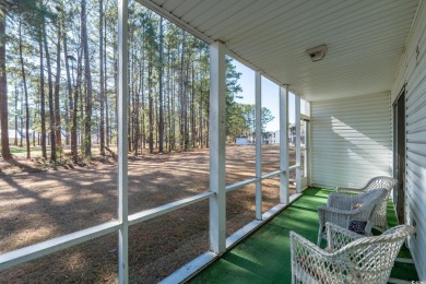 GOLF COURSE VIEW. This quaint retreat in the Colonial Charters on Palmetto Greens Golf and Country Club in South Carolina - for sale on GolfHomes.com, golf home, golf lot