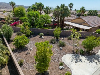 Lovely extended LANAI model on beautiful park-like large lot on Mountain Vista Golf Course At Sun City Palm Desert in California - for sale on GolfHomes.com, golf home, golf lot