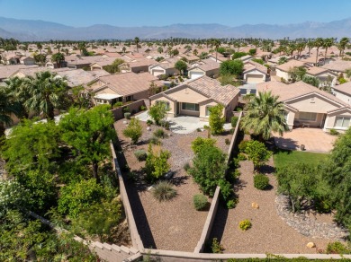 Lovely extended LANAI model on beautiful park-like large lot on Mountain Vista Golf Course At Sun City Palm Desert in California - for sale on GolfHomes.com, golf home, golf lot