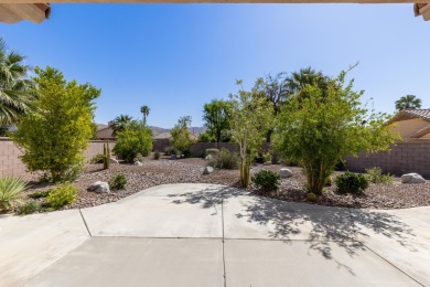 Lovely extended LANAI model on beautiful park-like large lot on Mountain Vista Golf Course At Sun City Palm Desert in California - for sale on GolfHomes.com, golf home, golf lot