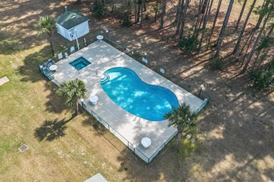 GOLF COURSE VIEW. This quaint retreat in the Colonial Charters on Palmetto Greens Golf and Country Club in South Carolina - for sale on GolfHomes.com, golf home, golf lot