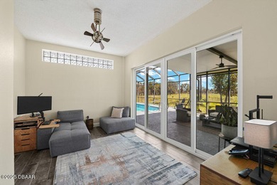 FULLY FURNISHED 5 bedroom 4 bathroom luxurious pool home sits in on Spruce Creek Golf Club in Florida - for sale on GolfHomes.com, golf home, golf lot