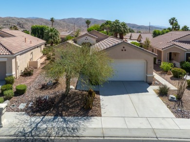 Lovely extended LANAI model on beautiful park-like large lot on Mountain Vista Golf Course At Sun City Palm Desert in California - for sale on GolfHomes.com, golf home, golf lot
