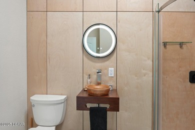 FULLY FURNISHED 5 bedroom 4 bathroom luxurious pool home sits in on Spruce Creek Golf Club in Florida - for sale on GolfHomes.com, golf home, golf lot