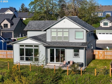 Welcome to this beautiful Craftsman-style home, situated above on Lewis and Clark Public Golf Course in Oregon - for sale on GolfHomes.com, golf home, golf lot