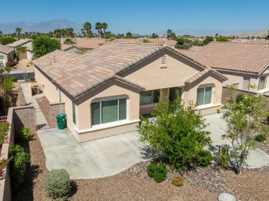 Lovely extended LANAI model on beautiful park-like large lot on Mountain Vista Golf Course At Sun City Palm Desert in California - for sale on GolfHomes.com, golf home, golf lot