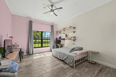 FULLY FURNISHED 5 bedroom 4 bathroom luxurious pool home sits in on Spruce Creek Golf Club in Florida - for sale on GolfHomes.com, golf home, golf lot