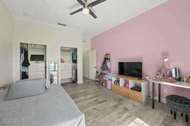 FULLY FURNISHED 5 bedroom 4 bathroom luxurious pool home sits in on Spruce Creek Golf Club in Florida - for sale on GolfHomes.com, golf home, golf lot