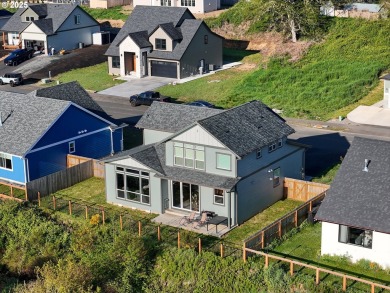 Welcome to this beautiful Craftsman-style home, situated above on Lewis and Clark Public Golf Course in Oregon - for sale on GolfHomes.com, golf home, golf lot