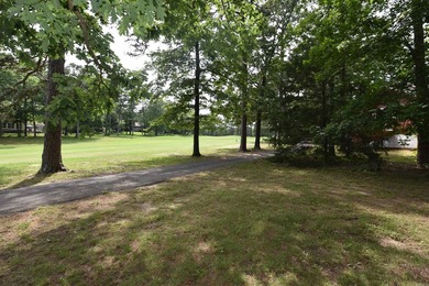 Experience the casual lifestyle of golf course living in this on Indian Hills Country Club in Arkansas - for sale on GolfHomes.com, golf home, golf lot