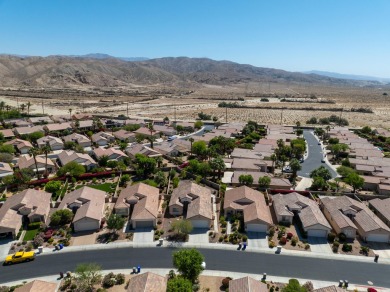 Lovely extended LANAI model on beautiful park-like large lot on Mountain Vista Golf Course At Sun City Palm Desert in California - for sale on GolfHomes.com, golf home, golf lot