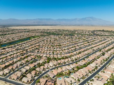 Lovely extended LANAI model on beautiful park-like large lot on Mountain Vista Golf Course At Sun City Palm Desert in California - for sale on GolfHomes.com, golf home, golf lot