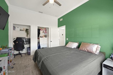 FULLY FURNISHED 5 bedroom 4 bathroom luxurious pool home sits in on Spruce Creek Golf Club in Florida - for sale on GolfHomes.com, golf home, golf lot