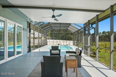 FULLY FURNISHED 5 bedroom 4 bathroom luxurious pool home sits in on Spruce Creek Golf Club in Florida - for sale on GolfHomes.com, golf home, golf lot