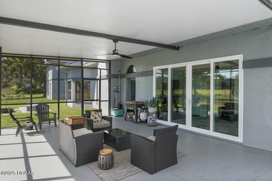 FULLY FURNISHED 5 bedroom 4 bathroom luxurious pool home sits in on Spruce Creek Golf Club in Florida - for sale on GolfHomes.com, golf home, golf lot