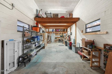 FULLY FURNISHED 5 bedroom 4 bathroom luxurious pool home sits in on Spruce Creek Golf Club in Florida - for sale on GolfHomes.com, golf home, golf lot