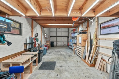 FULLY FURNISHED 5 bedroom 4 bathroom luxurious pool home sits in on Spruce Creek Golf Club in Florida - for sale on GolfHomes.com, golf home, golf lot