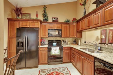 Located in the gated community of PGA National, this fully on PGA National Golf Club in Florida - for sale on GolfHomes.com, golf home, golf lot