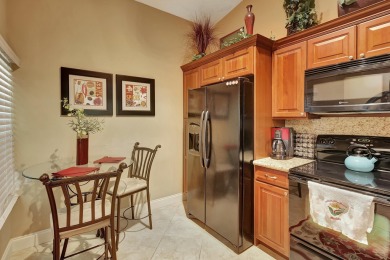 Located in the gated community of PGA National, this fully on PGA National Golf Club in Florida - for sale on GolfHomes.com, golf home, golf lot