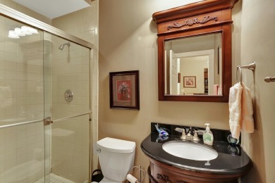 Located in the gated community of PGA National, this fully on PGA National Golf Club in Florida - for sale on GolfHomes.com, golf home, golf lot