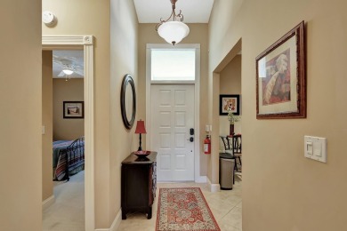Located in the gated community of PGA National, this fully on PGA National Golf Club in Florida - for sale on GolfHomes.com, golf home, golf lot