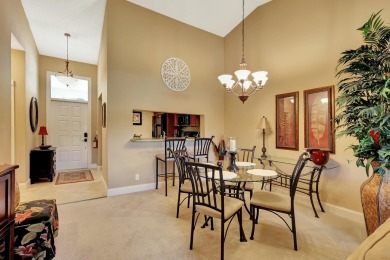 Located in the gated community of PGA National, this fully on PGA National Golf Club in Florida - for sale on GolfHomes.com, golf home, golf lot