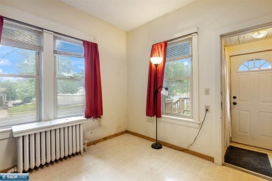 This charming 2-bedroom, 1-bath home is all about easy living on Hibbing Municipal Golf Course in Minnesota - for sale on GolfHomes.com, golf home, golf lot