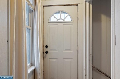 This charming 2-bedroom, 1-bath home is all about easy living on Hibbing Municipal Golf Course in Minnesota - for sale on GolfHomes.com, golf home, golf lot