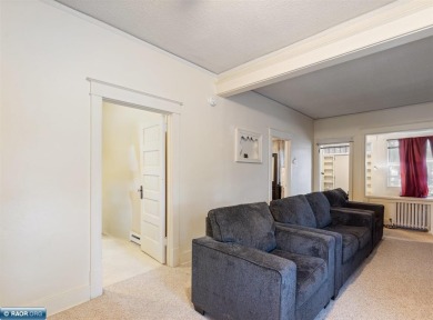 This charming 2-bedroom, 1-bath home is all about easy living on Hibbing Municipal Golf Course in Minnesota - for sale on GolfHomes.com, golf home, golf lot
