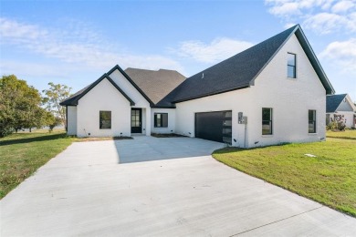 Experience luxury living in this custom-built home overlooking on Kings Creek Golf Club in Texas - for sale on GolfHomes.com, golf home, golf lot