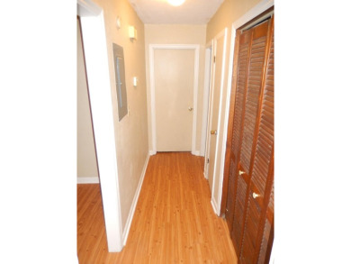 LOVELY Occupied SE Duplex w/ Carports, Fenced Yards, & Storage on Hilaman Park Golf Course in Florida - for sale on GolfHomes.com, golf home, golf lot