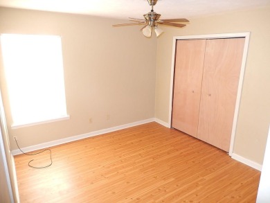 LOVELY Occupied SE Duplex w/ Carports, Fenced Yards, & Storage on Hilaman Park Golf Course in Florida - for sale on GolfHomes.com, golf home, golf lot
